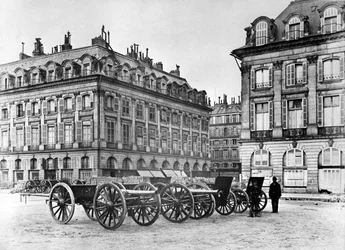 Paris Street with Barricade and Cannons, 1870